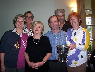 Winners: Therese Tully, Sue Lusk, Lindy Vincent and Richard Ward.  Back Row: Tony Jackman and Keith McDonald.